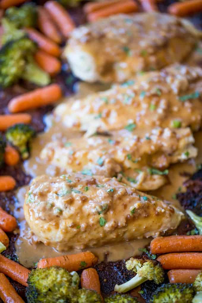 Sheet Pan Peanut Chicken and Vegetables is an easy, but authentic weeknight dinner with almost no cleanup! Serve with rice or noodles.