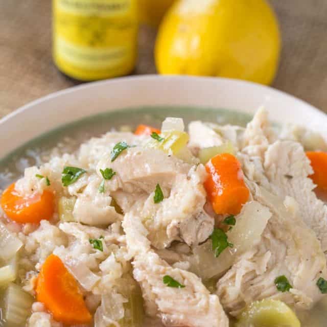 Slow Cooker Chicken and Rice Soup with brown rice and chicken breasts, this soup is comforting and warm with no extra added fat and with the use of lemon extract it can be made from pantry ingredients any time of year.