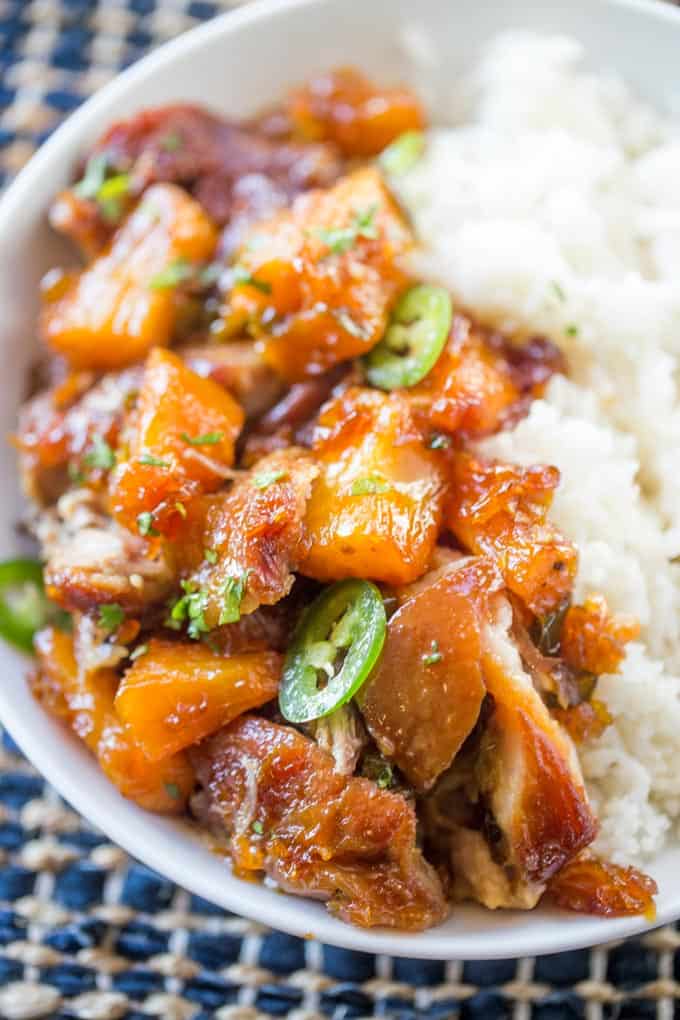 Slow Cooker Jalapeno Pineapple Pork with just six ingredients is crispy with a sweet, sticky, spicy glaze and meltingly soft pineapple chunks.