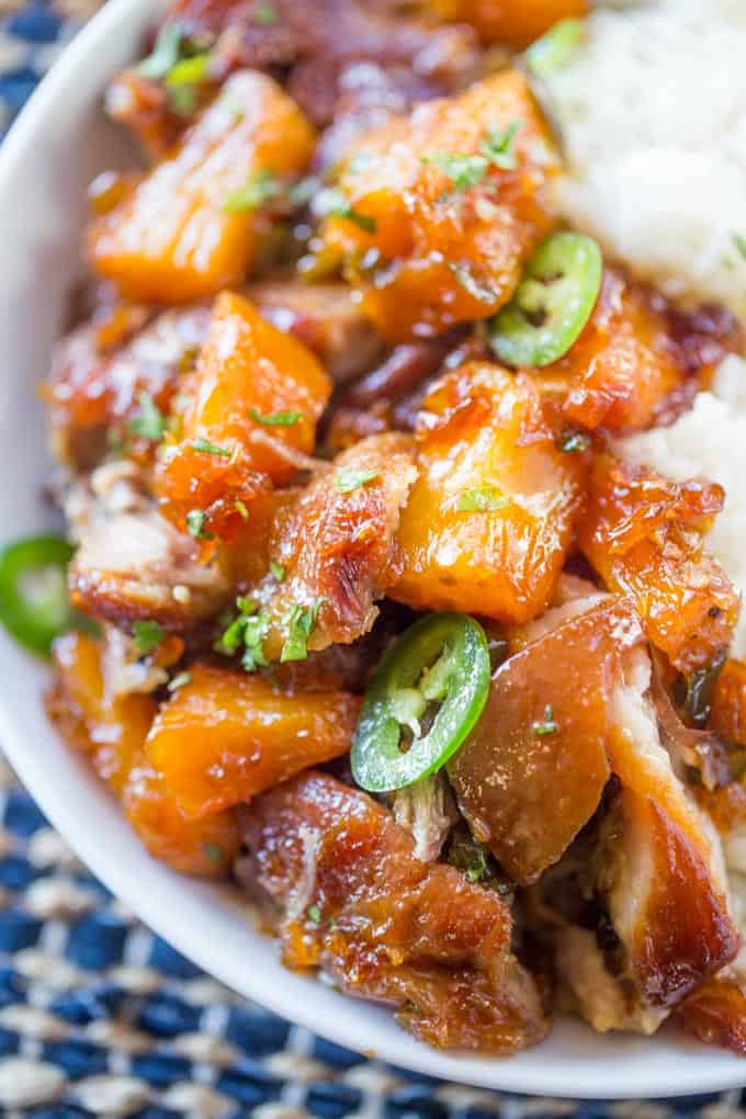 Slow Cooker Jalapeno Pineapple Pork with just six ingredients is crispy with a sweet, sticky, spicy glaze and meltingly soft pineapple chunks.