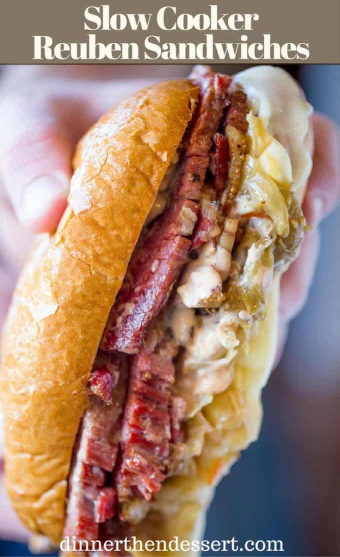 Slow Cooker Reuben Sandwiches are perfect for leftover corned beef after your St. Patrick's Day dinner with a quick sauerkraut, Swiss cheese and thousand island dressing.