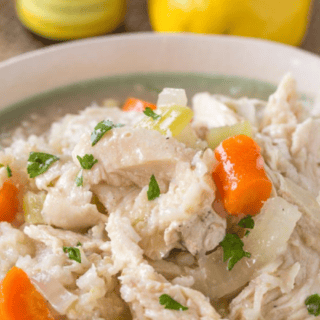 Closeup of poultry, veggies, and rice in a bowl