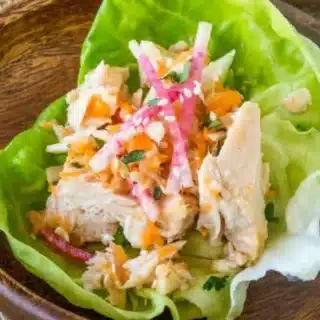 lettuce cup on a brown plate