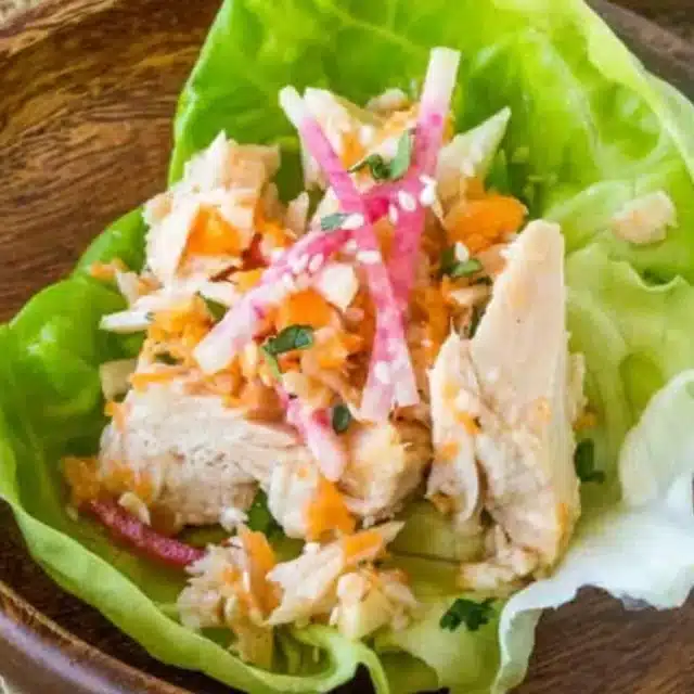 lettuce cup on a brown plate
