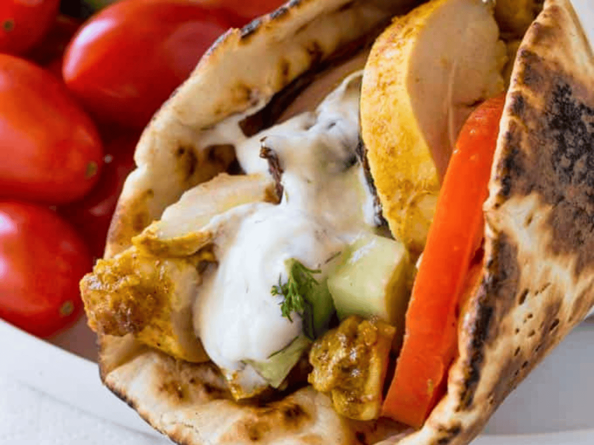 Pita Wrap with chicken tomatoes and sauce