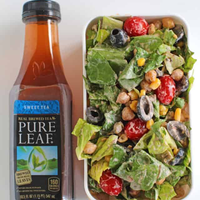Chickpea Tex Mex Salad made with crispy seasoned chickpeas, avocados, olives, corn and a greek yogurt salsa in less than 20 minutes.