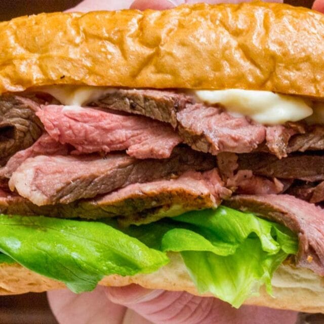 Holding assembled sandwich closeup