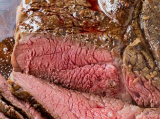 Slow Cooker Roast Beef that you can slice into tender slices cooked to a perfect medium temperature. Enjoy for dinner or sliced thinly in sandwiches, you will never buy the deli variety again!