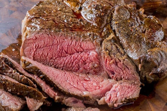 Slow Cooker Roast Beef that you can slice into tender slices cooked to a perfect medium temperature. Enjoy for dinner or sliced thinly in sandwiches, you will never buy the deli variety again! 