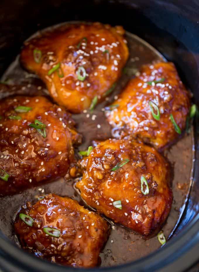 slow cooker teriyaki chicken sprinkled with green onions