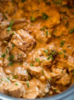 Slow Cooker Thai Peanut Chicken is an easy weeknight meal made with coconut milk, lime juice, peanut butter, ginger and garlic. Skip the delivery!