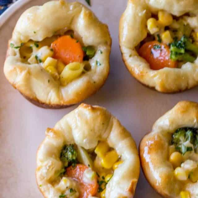 Cheesy Ranch Chicken Puffs made with a quick and easy skillet meal and frozen bread dough or pizza dough makes a perfect after-school snack or portable dinner bites.