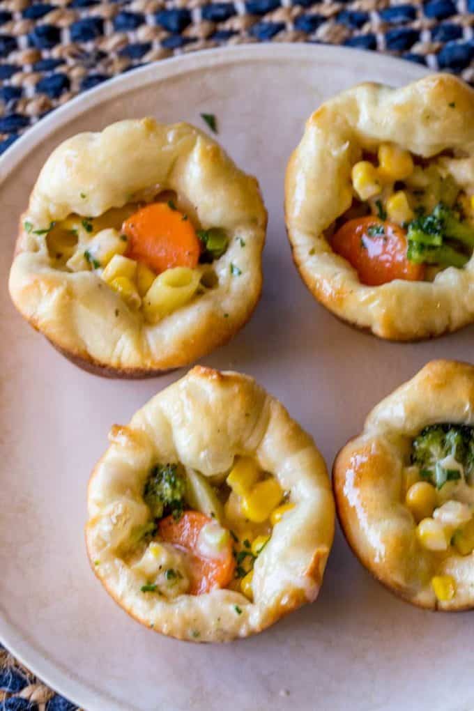 Cheesy Ranch Chicken Puffs made with a quick and easy skillet meal and frozen bread dough or pizza dough makes a perfect after-school snack or portable dinner bites.