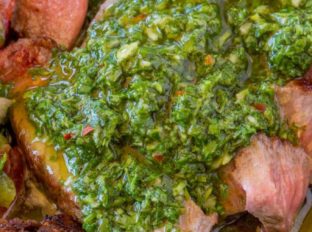 Chimichurri Sauce is an addicting, crazy easy marinade and sauce you'll enjoy all summer long that is the perfect topping (and marinade) to all things grilled.