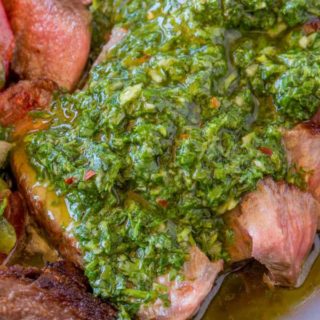 Chimichurri Sauce is an addicting, crazy easy marinade and sauce you'll enjoy all summer long that is the perfect topping (and marinade) to all things grilled.