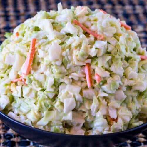 coleslaw piled high in mound in bowl