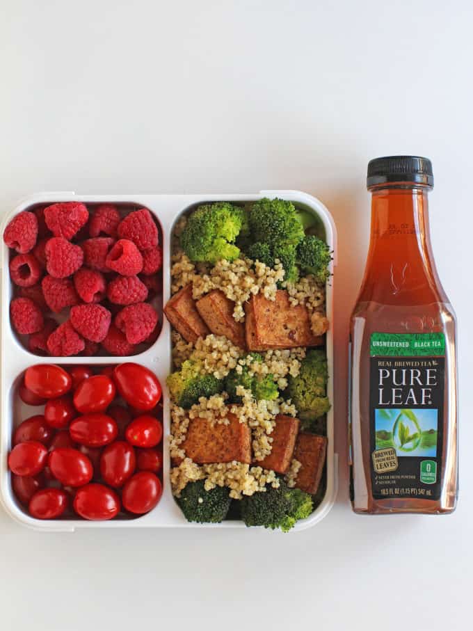 tea bottle next to tofu and broccoli