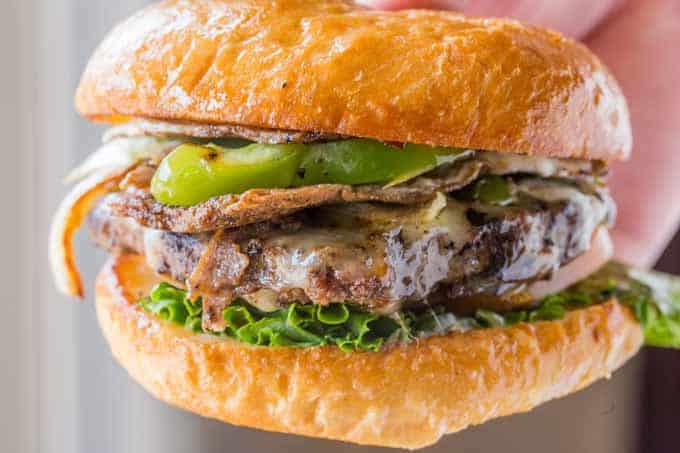 Philly Cheese Steak Burgers in hand, a perfect party burger!