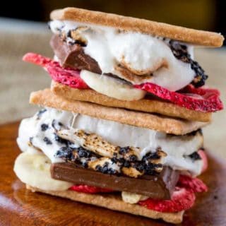 Banana Split S'mores are a crunchy, melty, sweet and tart summer treat with chocolate, graham crackers, marshmallows and freeze dried fruits.