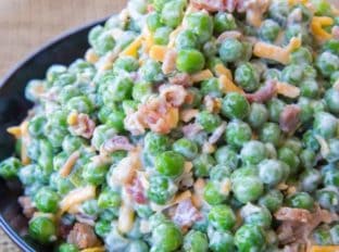 Creamy Bacon Pea Salad with mayonnaise, bacon, cheddar cheese and crunch peas. The perfect southern summer side dish!