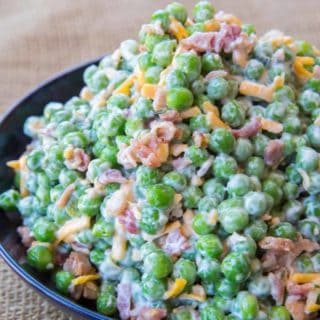 Creamy Bacon Pea Salad with mayonnaise, bacon, cheddar cheese and crunch peas. The perfect southern summer side dish!