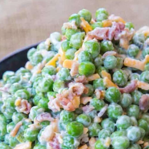 Salad with mayonnaise, bacon, cheddar cheese and crunch peas.