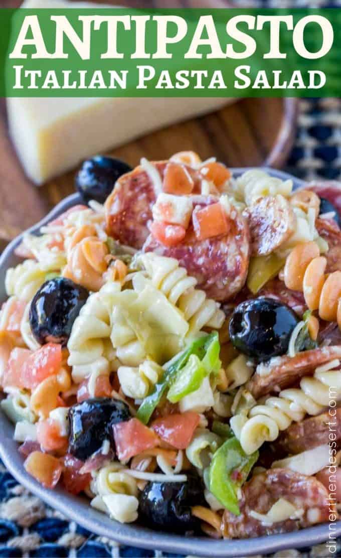 pasta salad with olives, tomatoes, bell peppers, and cheese.