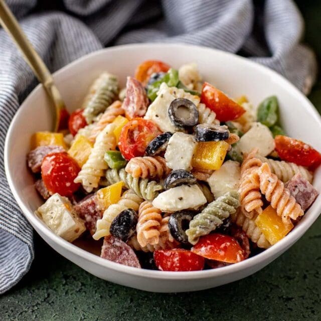 Bowl of pasta salad with a spoon.