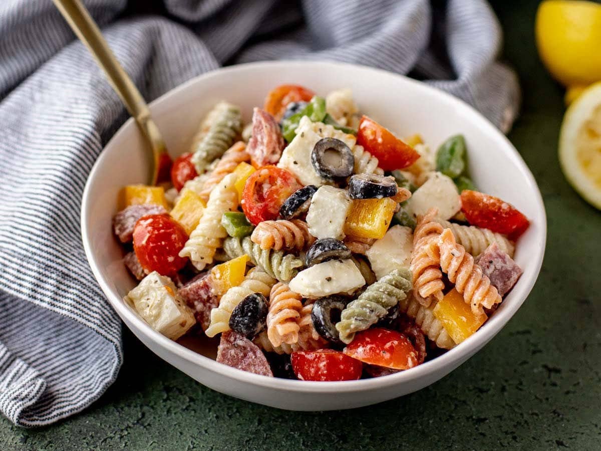 Bowl of pasta salad with a spoon.