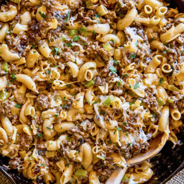 Philly cheesesteak pasta in cast iron skillet