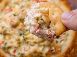 Spicy Louisiana Shrimp Dip is a spicy, creamy dip with cajun spices that you can make in 30 minutes. It'll be the hit of your party!