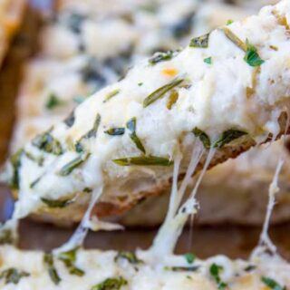 Melty cheese on piece of bread