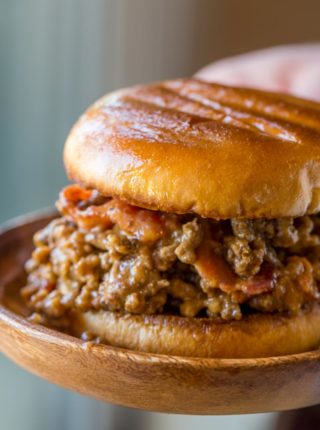 Bacon Cheeseburger Sloppy Joes with ground beef, tomato gravy, cheddar cheese and crisp bacon is the ultimate bacon cheeseburger indulgence!