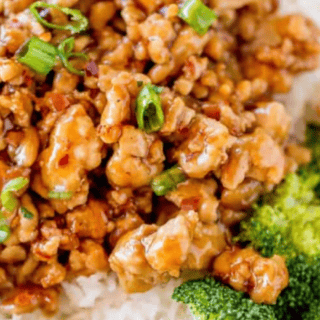 Close up of chicken with rice and broccoli