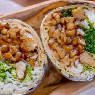 Finished burrito with rice, chicken, and veggies