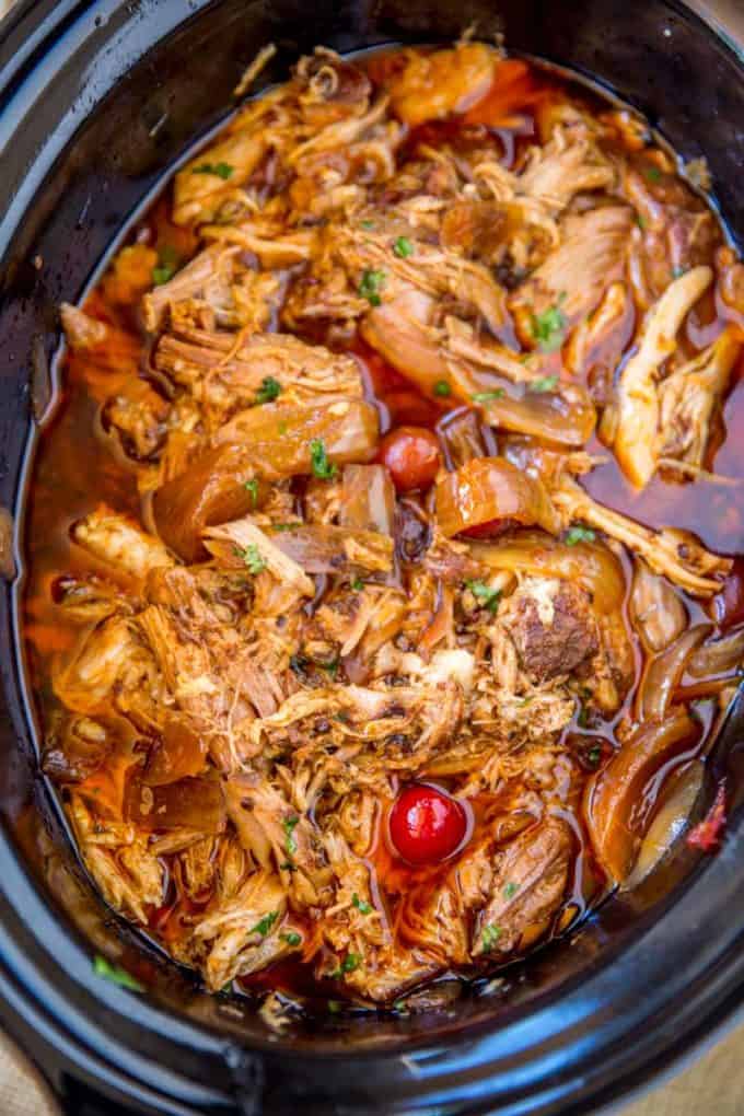 Slow Cooker Dr. Pepper Pulled Pork is sweet and spicy with brown sugar, and sweet with cherries and brown sugar.