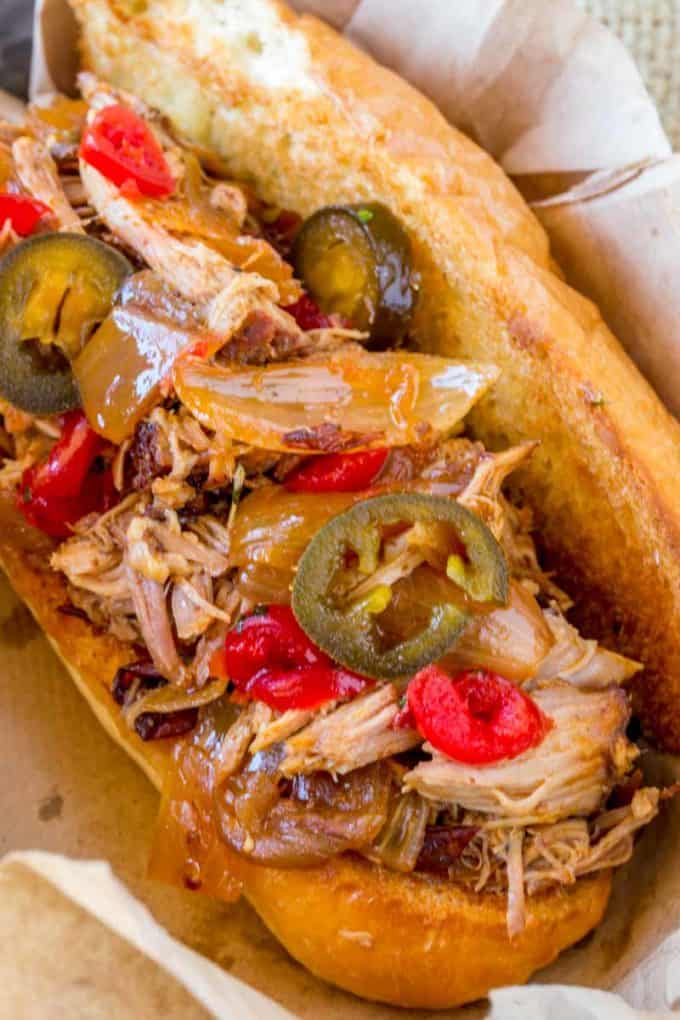 Slow Cooker Dr. Pepper Pulled Pork is perfect served many different ways including in these sub sandwiches.