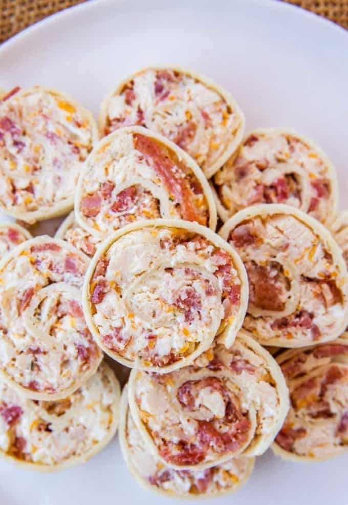Cheddar Bacon Ranch Pinwheels made in just 15 minutes with chicken, ranch seasoning, cream cheese and tortillas make the perfect lunch bites or afterschool snack.