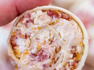 Cheddar Bacon Ranch Pinwheels are the perfect afternoon snack! You'll love them!