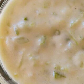 Condensed celery soup in a glass jar