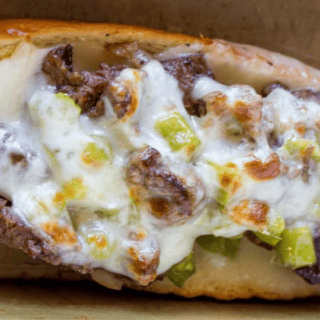 meat, veggies and cheese in a hogie