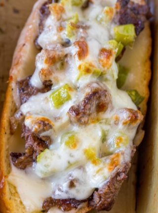 Oven Baked Philly Cheesesteak Sandwiches made for a crowd in just 30 minutes. Hot and freshly baked sandwiches for a crowd with none of the hard work!