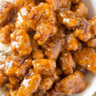 Panda Express Orange Chicken with tender chicken thighs fried crisp and tossed in a magical perfect-copycat sauce!