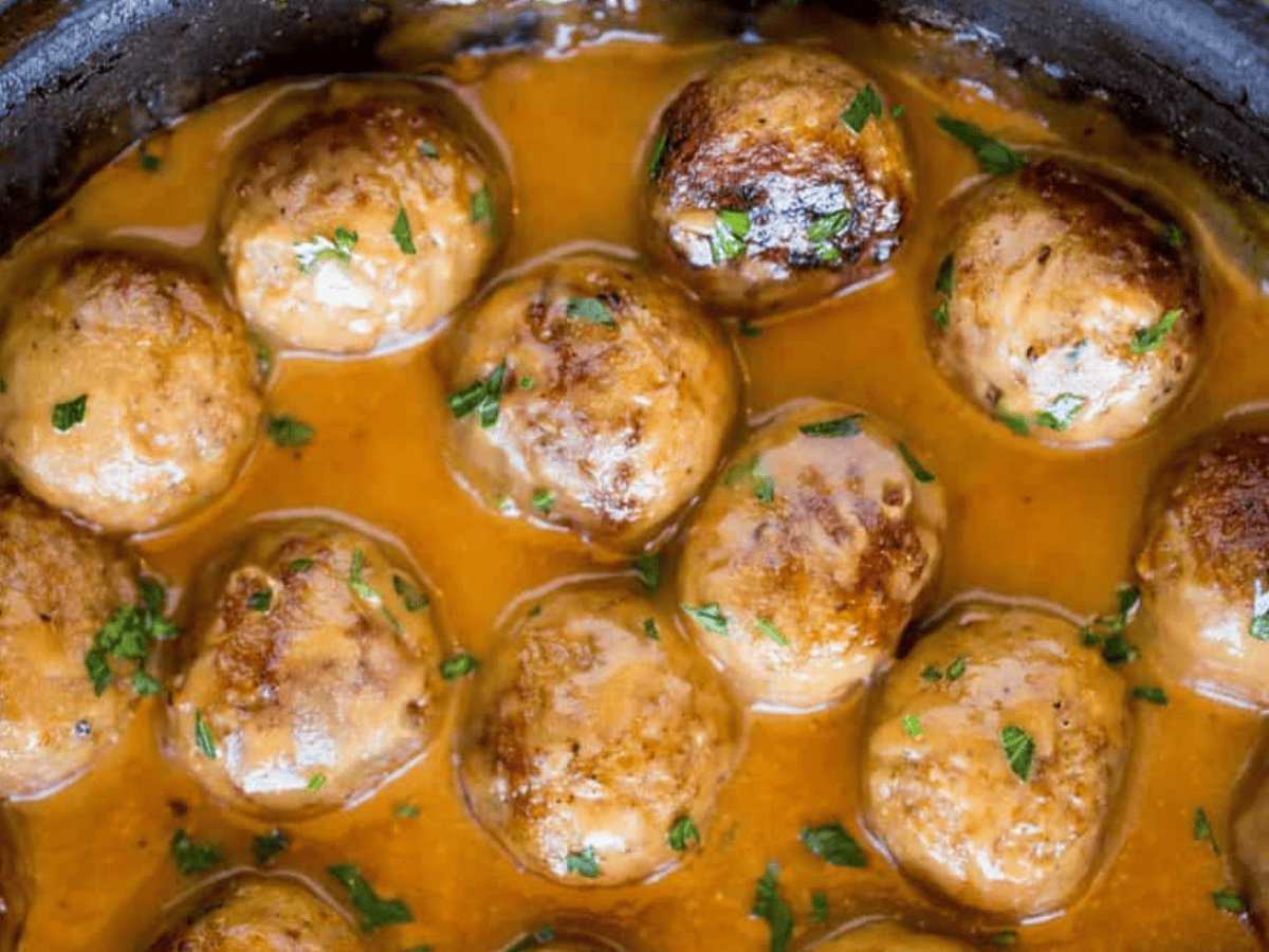 Meatballs cooking in pot
