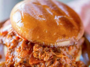 Pizza Sloppy Joes with all your favorite pepperoni pizza flavors and a couple of vegetables your kids won't even notice. Cheesy, sloppy, pizza sloppy goodness!