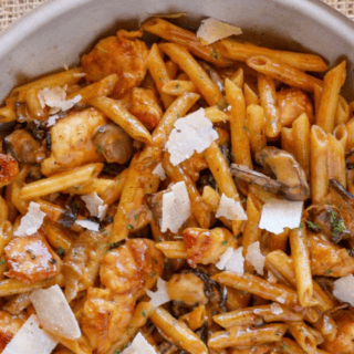 pasta topped with cheese in a pan