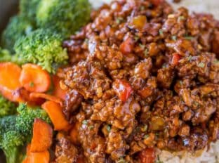 Ground Kung Pao Chicken with chopped zucchini, bell peppers and crunchy peanuts in Panda Express copycat sauce and done in 20 minutes!
