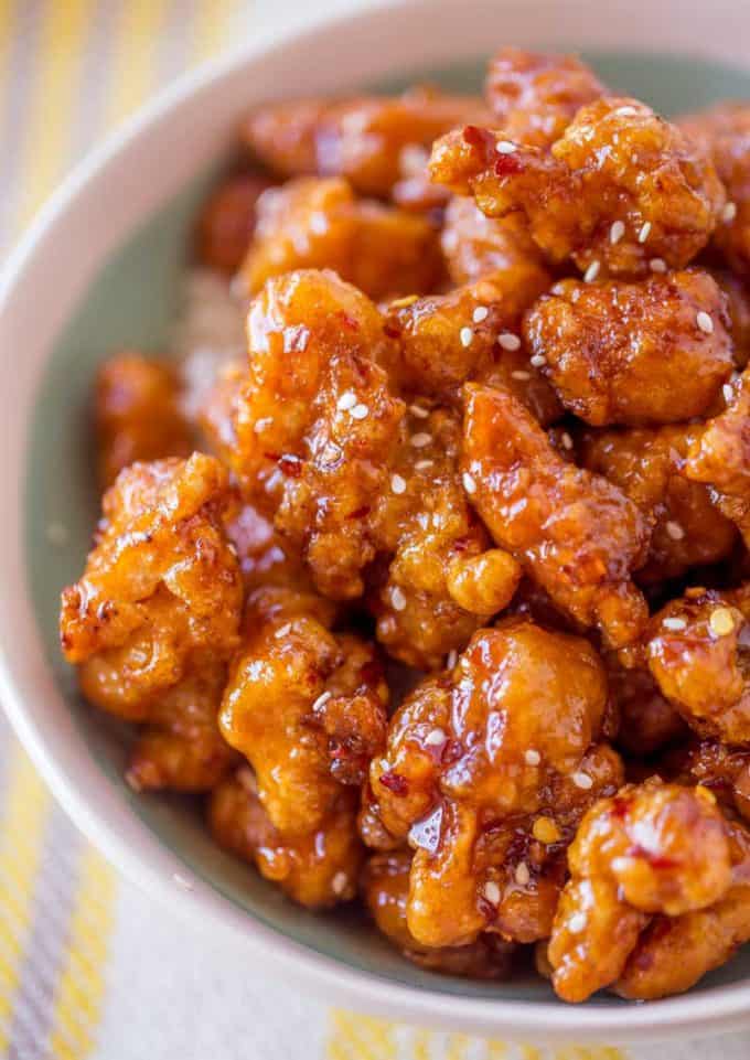 Crispy Korean Fried Chicken in a spicy, sweet glaze that is so crispy and sticky you'll coat everything in this sauce from wings to baked chicken breasts and more!