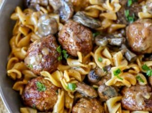 Quick and EASY Meatball Stroganoff in just 30 minutes with a creamy sour cream mushroom gravy, egg noodles and meatballs, it's the perfect weeknight meal!