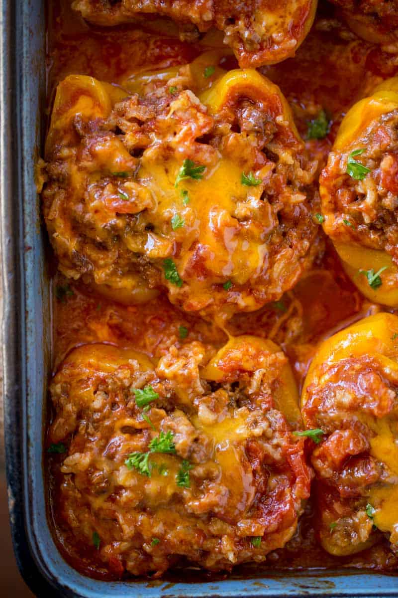 Easy Cheesy Mexican Stuffed Bell Peppers taste like your favorite cheesy taco pasta! They're like cheesy taco stuffed peppers!